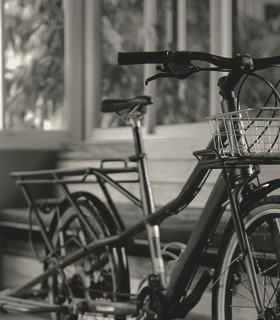 Example bike repair shop: bicycles waiting inside the shop doorway