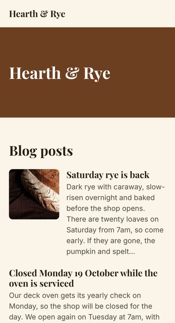 Home page of Hearth & Rye’s example Stratafold-hosted website at phone width: a brown band with the name in serif lettering, then its blog posts with photos